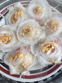 特色美食蒜蓉粉丝蒸扇贝做法图解7)