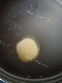 美味的皮蛋瘦肉粥做法图解7)