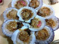 味道不错的蒜蓉粉丝蒸扇贝做法图解5)