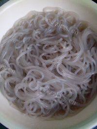 诱人的酸菜炖粉条做法图解6)