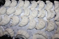 人间美味般的酸菜猪肉饺做法图解10)