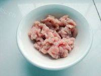 诱人的皮蛋瘦肉粥做法图解3)