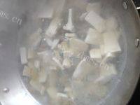 十分诱人的蛤蜊豆腐汤做法图解4)