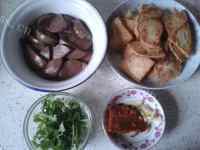 美味的香辣鸭血豆腐做法图解4)
