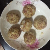 美味的红烧狮子头做法图解5)