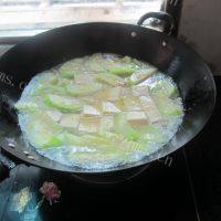 家常菜豆腐丝瓜汤做法图解10)
