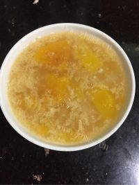 椰子汁木瓜炖雪蛤做法图解7)