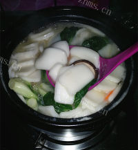 清淡的鸡蛋青菜年糕汤做法图解12)