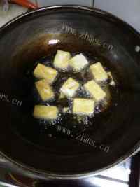 美味的酱烧豆干肉片做法图解3)