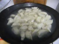 简易的香菇猪肉水饺做法图解14)