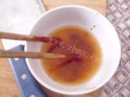 香辣辣炒年糕做法图解8)