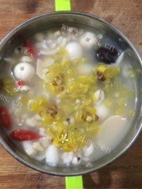 滋补养胃梅花莲子燕麦粥做法图解10)