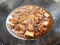 家常菜豆干烧肉做法图解9)