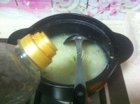 可口的青菜海鲜粥做法图解3)