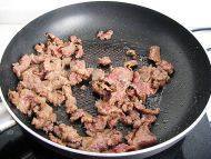 诱人的洋葱黑椒牛肉做法图解3)