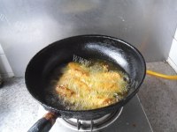 好吃的金蒜鸡翅做法图解8)