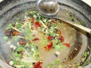 诱人的姜葱炒花蛤做法图解2)