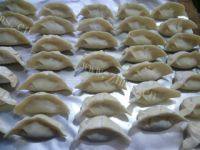 色味俱全的白菜猪肉馅饺子做法图解13)