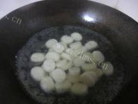 诱人的腊肉炒年糕做法图解5)