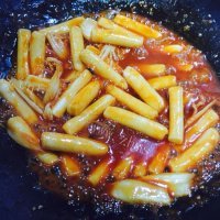 自制白菜炒年糕做法图解4)