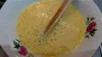 家常菜茼蒿炒鸡蛋做法图解4)