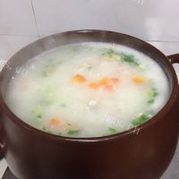 海鲜砂锅粥做法图解6)