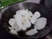 家常菜肉片炒茭白做法图解7)