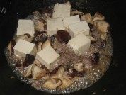 家常菜蘑菇肉末豆腐做法图解6)