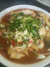 回味无穷的水煮鱼做法图解4)