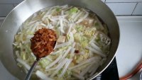 家常菜白菜炖冻豆腐做法图解10)