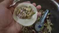 好吃的酸菜肉餡水餃做法图解4)