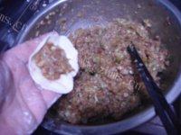 易做的猪肉白菜饺子做法图解9)