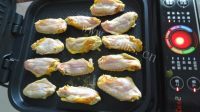 鲜嫩的烤盐焗鸡翅的做法图解三