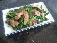 家常猪肉炒韭菜做法图解9)