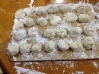 特色的生煎大白菜猪肉包做法图解5)