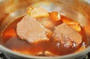 美味的卤牛肉豆干做法图解7)