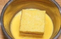 美味的鸡蛋火腿吐司做法图解4)