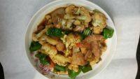 菜花炒肉做法图解9)