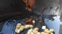 香喷喷的香干焖老鸭做法图解4)