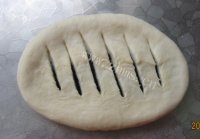 口感极佳的豆沙卷面包做法图解5)
