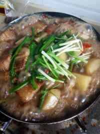 诱人的土豆红烧肉做法图解10)