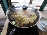家常菜花菜炒肉片做法图解13)