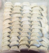 美味的鸡蛋木耳饺子做法图解6)