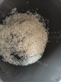 干贝萝卜嫩鸡饭做法图解5)