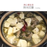 美味的酸菜豆腐炖猪肚做法图解6)