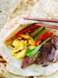 美味的布袋烙饼卷肉做法图解17)
