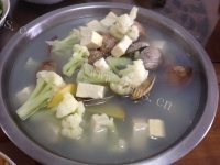 美味的花蛤豆腐汤做法图解7)