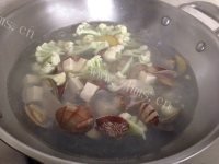 美味的花蛤豆腐汤做法图解5)