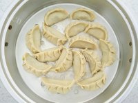 香气浓郁的韭菜猪肉蒸饺做法图解10)