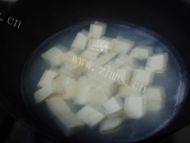蛤蜊炖豆腐做法图解4)